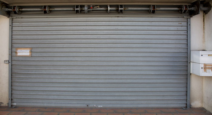 Commercial roll up door repairs Syracuse