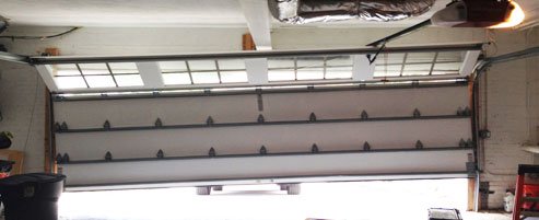 Out of track roll up door Syracuse